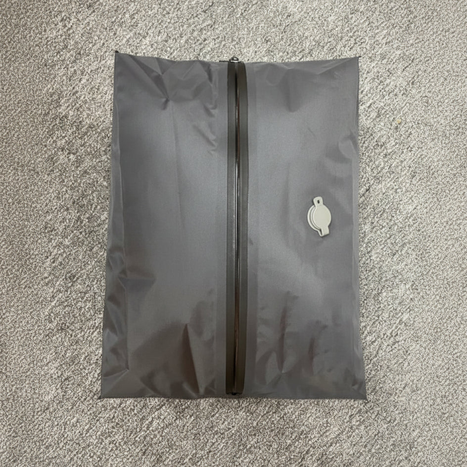 sac de compression voyage gris pour rangement optimise et gain de place en valise