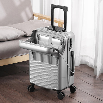 Petite valise trolley Zen cabine argent dans un salon moderne, pochette PC ouverte