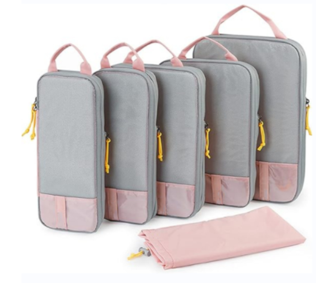 Présentation sac de compression voyage rose pour rangement organisé