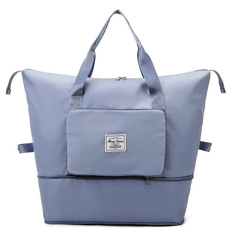 Sac week end femme extensible pliable bleu sur fond blanc