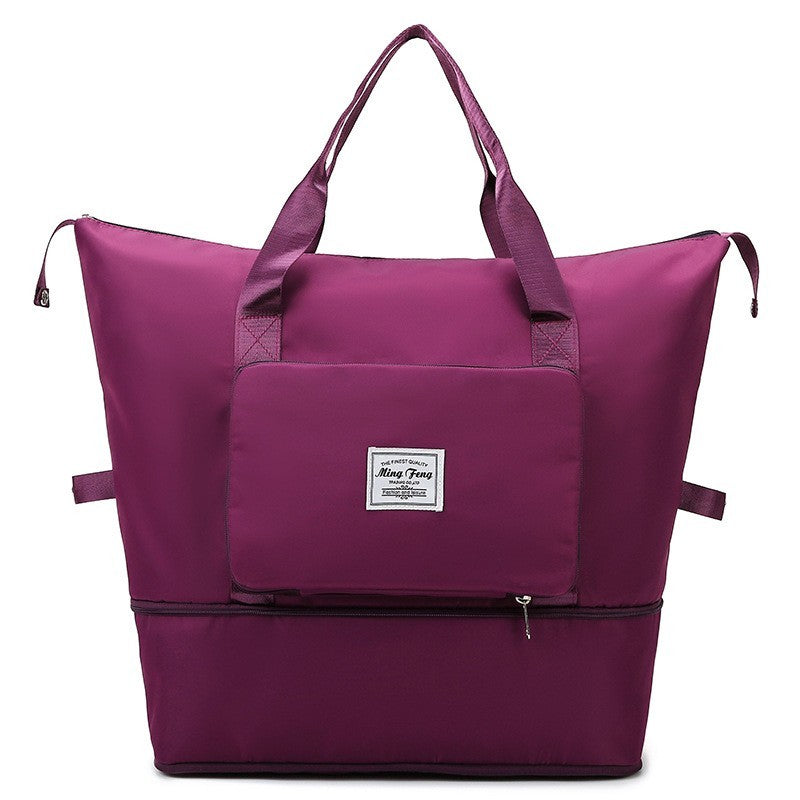 Sac week end femme extensible pliable fushia sur fond blanc
