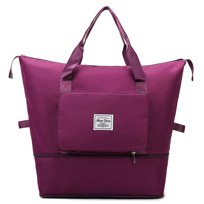 Sac week end femme extensible pliable fushia sur fond blanc