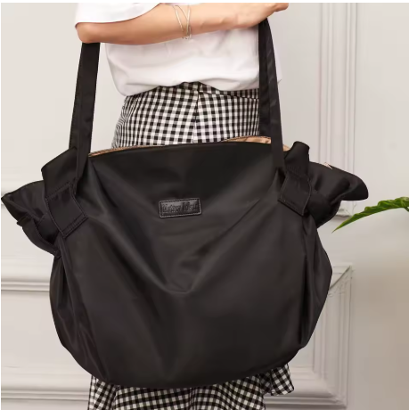 Sac de voyage femme noir grand format style moderne, idéal pour week-end, shopping et déplacement