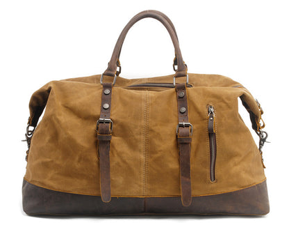sac de weekend élégant en toile cirée camel design intemporel et finitions cuir marron idéal pour voyager avec style et praticité