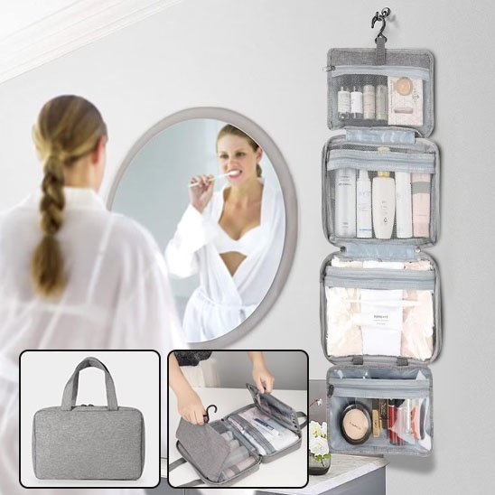 Femme dans le miroir se préparant pour le travail Trousse de toilette femme grise accrochée sur le mur