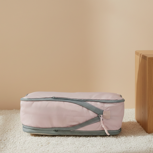 Organisateur de valise premium rose compact avec fermeture zippée et design minimaliste