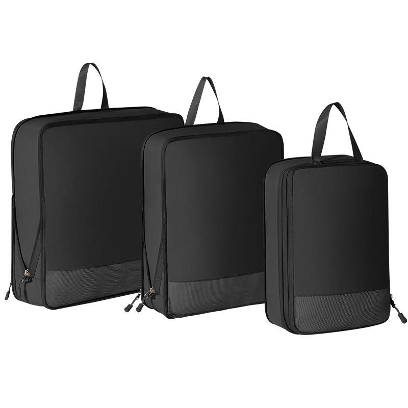 Organisateur valise élégant et robuste 3pcs noir, sacs de compression voyage sur fond blanc, design sobre et résistant pour une organisation optimale.