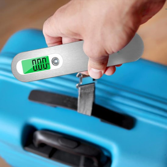 Pèse Valise Prise Sûre Ultra-Compact sur valise bleu