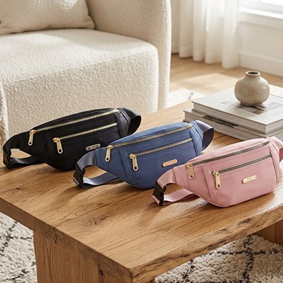 Sac banane femme en démonstration en trois couleurs sur table
