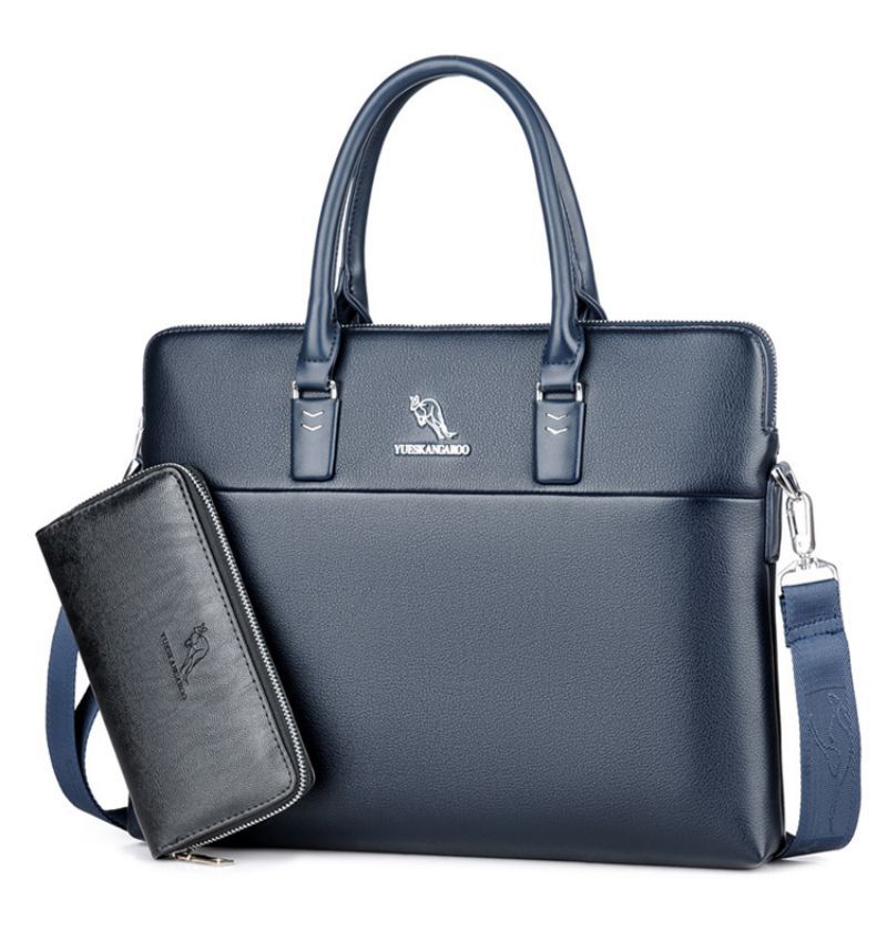 Sacoche ordinateur homme professionnelle bleu foncé pour ordinateur portable avec finition cuir, livrée avec portefeuille assorti, design sobre et moderne.