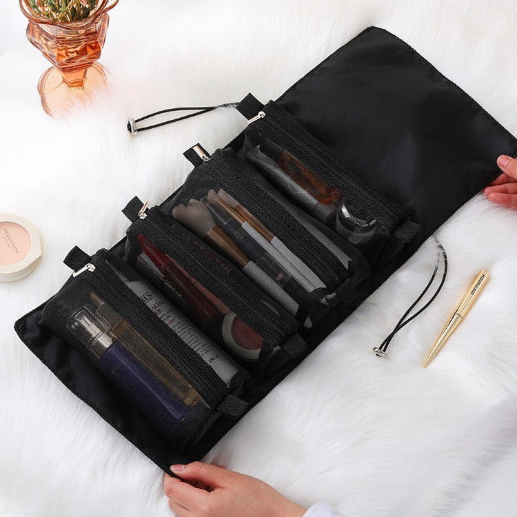 trousse de toilette Zen-Essentiel noir sur serviette