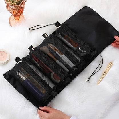 trousse de toilette Zen-Essentiel noir sur serviette