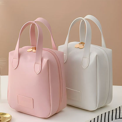 trousse maquillage rose sur le devant et blanche à l'arrière pour montrer les 2 variantes du produit