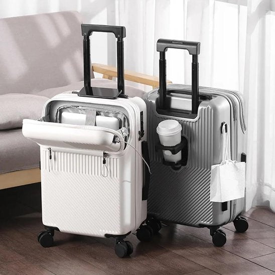 Valise rigide 24 pouces blanche et grise avec rangement pour PC ouvert et support a café en démontration